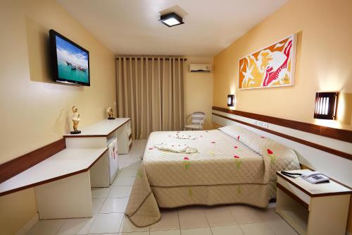 Postel nebo postele na pokoji v ubytování Coroa Vermelha Beach - All Inclusive