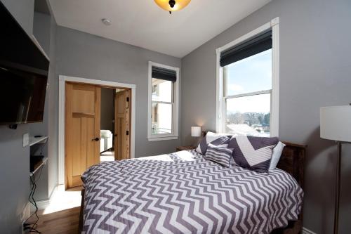 a bedroom with a bed and a window at Mears House Unit 2C in Durango