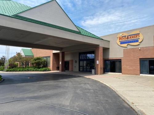 a motocross store with a parking lot in front of it at Clarion Hotel Conference Center on Lake Erie in Dunkirk