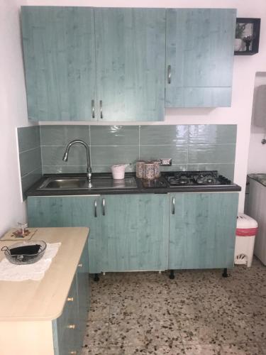 Kuchyň nebo kuchyňský kout v ubytování Casa Vacanze Flora