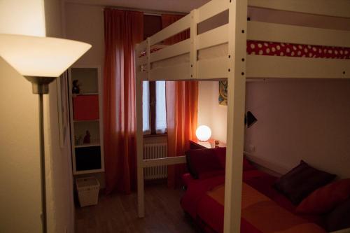 Двухъярусная кровать или двухъярусные кровати в номере Le Colombe