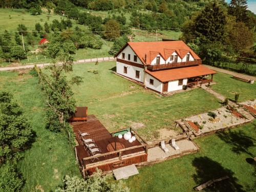 an aerial view of a house in a field at Casa cu Prispa in Sighişoara
