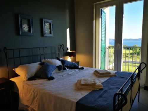 Un pat sau paturi într-o cameră la Villa Gorana