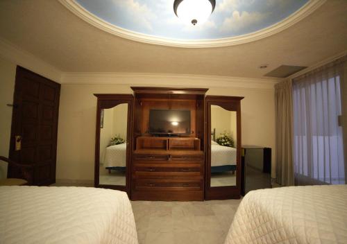 Cama o camas de una habitación en Hotel Francis Drake