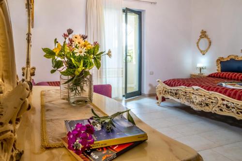 Postel nebo postele na pokoji v ubytování Torremerlata B&B