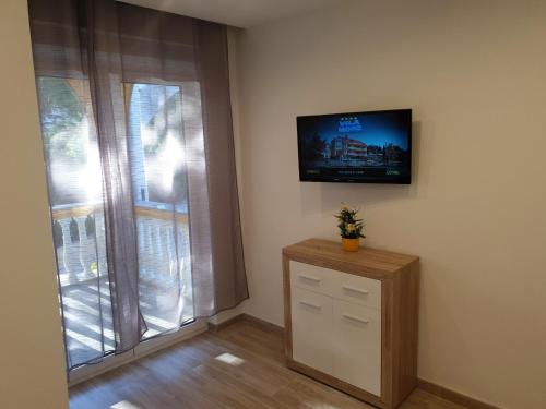 TV a/nebo společenská místnost v ubytování Vila More