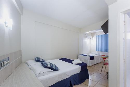 Voodi või voodid majutusasutuse Hotel Marjaí toas