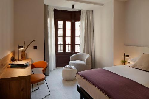 Letto o letti in una camera di Munna Hotel Boutique