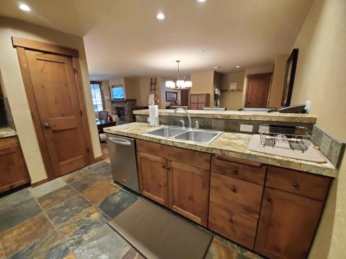 a kitchen with a sink and a counter top at Purgatory Lodge Unit 404 in Durango Mountain Resort