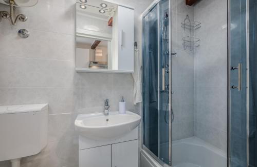 Ένα μπάνιο στο Apartment & Studio Goga