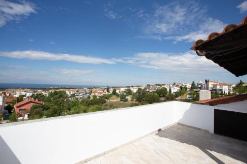 a view of the city from the roof of a house at Τraditional fully detached villa on a luxurious hillock of Thessaloniki with its own garden also for family & wedding gatherings for 10 to 25 people only 15 minutes from airport in Thessaloniki