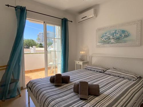 Postel nebo postele na pokoji v ubytování Mediterraneo bajo Casasol