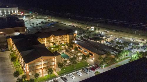 an overhead view of a hotel at night at Beachfront Palms Hotel Galveston in Galveston