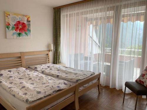 Postel nebo postele na pokoji v ubytování Casa Rosa