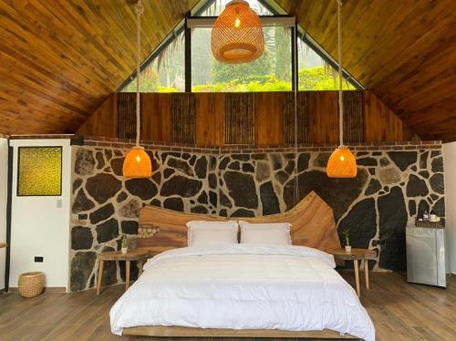 Postel nebo postele na pokoji v ubytování Rancho Ecoturistico el Faro