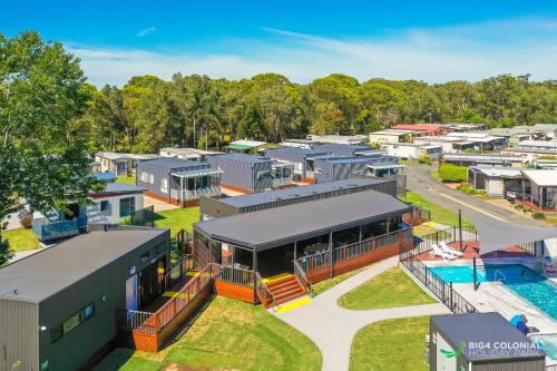 an aerial view of a rental property with a pool at BIG4 Colonial Holiday Park Harrington in Harrington