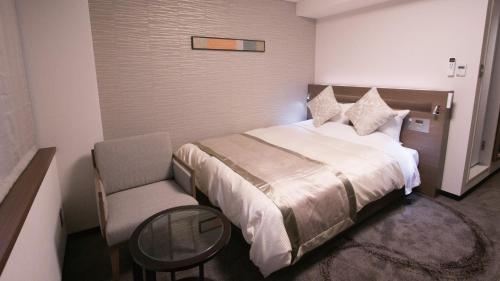 Postelja oz. postelje v sobi nastanitve Koriyama View Hotel Annex