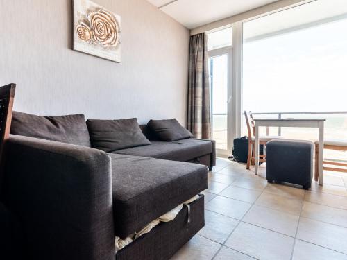 Zona d'estar a Contemporary apartment in Oostende with balcony
