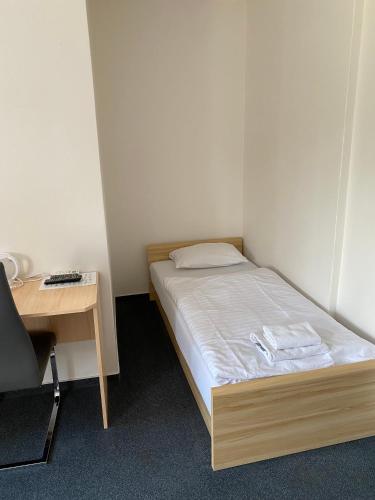 Postel nebo postele na pokoji v ubytování Penzion Na Císařství