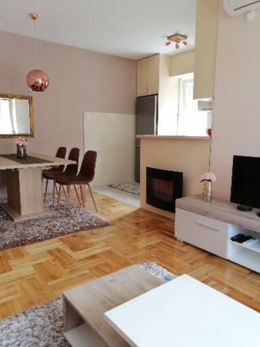 Телевізор і / або розважальний центр в Apartman Lav
