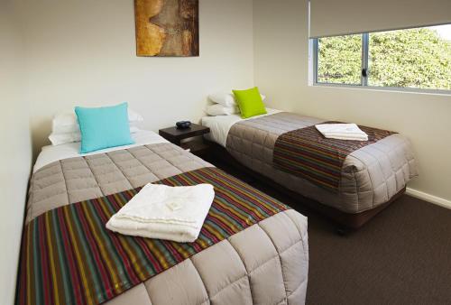 Katil atau katil-katil dalam bilik di Charlestown Executive Apartments
