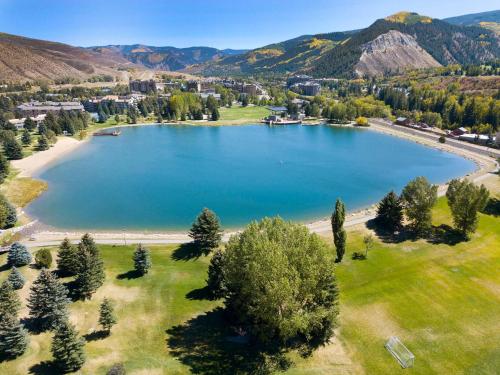 an aerial view of a large lake in the mountains at Ascent Residence 309 in Avon