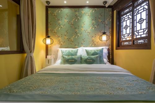 Photo de la galerie de l'établissement Lijiang Gui Yuan Tian Ju Guesthouse, à Lijiang