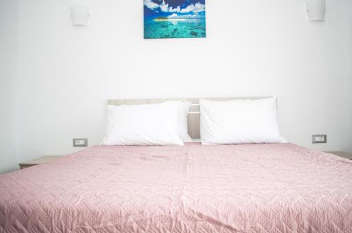 Katil atau katil-katil dalam bilik di Red Hibiscus Stegna