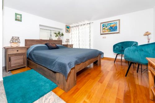 Postel nebo postele na pokoji v ubytování Guesthouse Ava