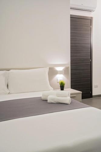 Postel nebo postele na pokoji v ubytování mc b&b