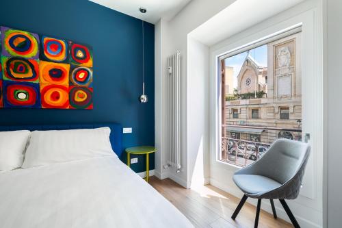 Кровать или кровати в номере Briseide Boutique Rooms Colosseum