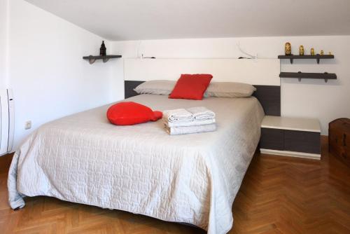 En eller flere senge i et værelse på Apartamento en Villa con parking
