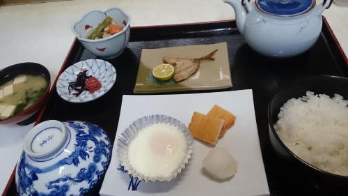 a tray of food with sushi and rice on it at Komecho Ryokan / Vacation STAY 33206 in Imabari