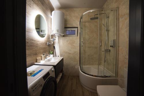 Koupelna v ubytování Luxury Apartments Petofi
