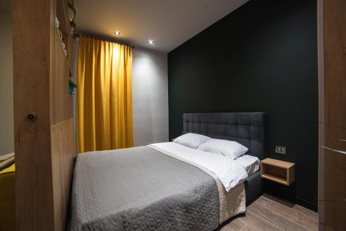 Postel nebo postele na pokoji v ubytování Luxury Apartments Petofi