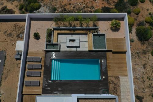an overhead view of a house with a swimming pool at Cairnvillas: Villa Terra C39 - Luxury Villa with Private Swimming Pool near Beach in Aljezur