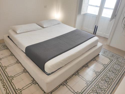 Posteľ alebo postele v izbe v ubytovaní Matteotti 21 Rooms