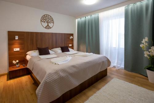 Postel nebo postele na pokoji v ubytování WX Hotel