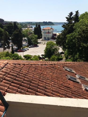 a view of the ocean from the roof of a building at Leonika Portorož in Portorož