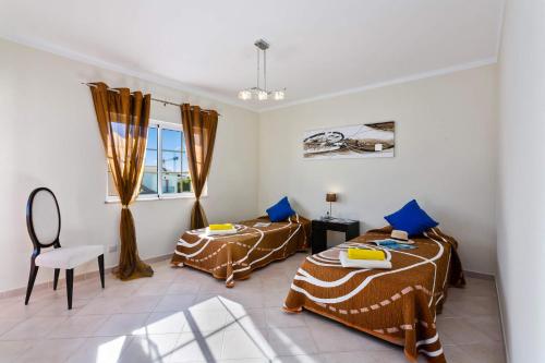 Postel nebo postele na pokoji v ubytování Villa Pera by Villa Plus