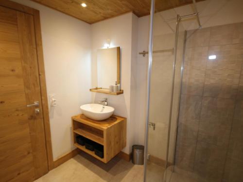 a bathroom with a sink and a shower at Appartement Hauteluce, 3 pièces, 6 personnes - FR-1-293-268 in Hauteluce