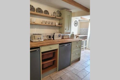 Kjøkken eller kjøkkenkrok på 4 Leghorn Cottage