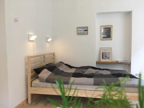 a bedroom with a bed in a room at Old Town Apartment in Cēsis