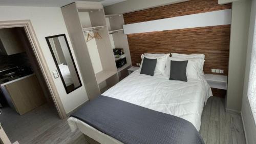 Postel nebo postele na pokoji v ubytování luxrooms