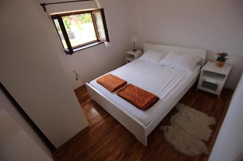 Posteľ alebo postele v izbe v ubytovaní Stone house Skrivena