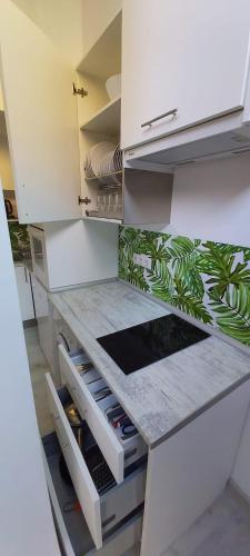 a kitchen with a counter with plates on it at valencialoft in Valencia