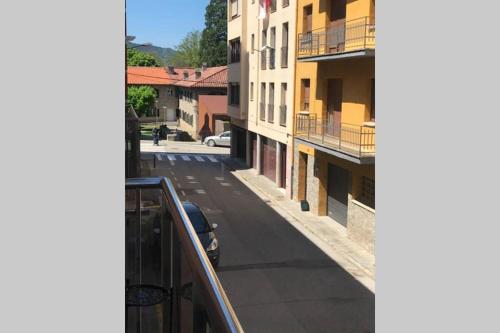 a view of a street from an apartment balcony at Apartament amb parking privat a St Joan de les Abadesses in Sant Joan de les Abadesses