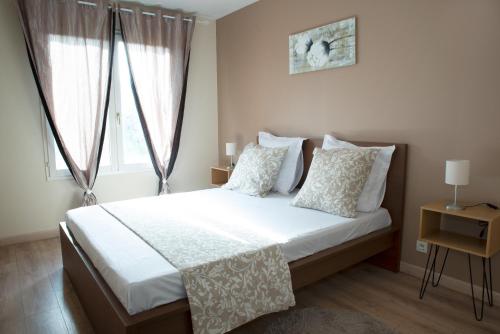 Giường trong phòng chung tại Villa avec Jardin 600m² Netflix proche Toulouse