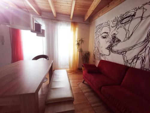 Кът за сядане в Charming 2-Room Apartment lakenear FeWo am See