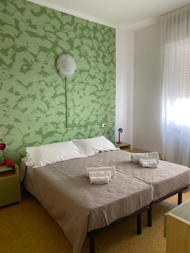 Ένα ή περισσότερα κρεβάτια σε δωμάτιο στο Villa Mirna